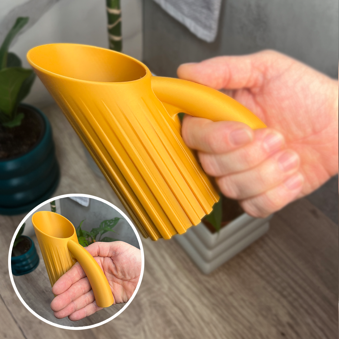 Close-up of the ergonomic handle on the Ribbed Soil Scoop, showcasing its comfortable grip for easy use.